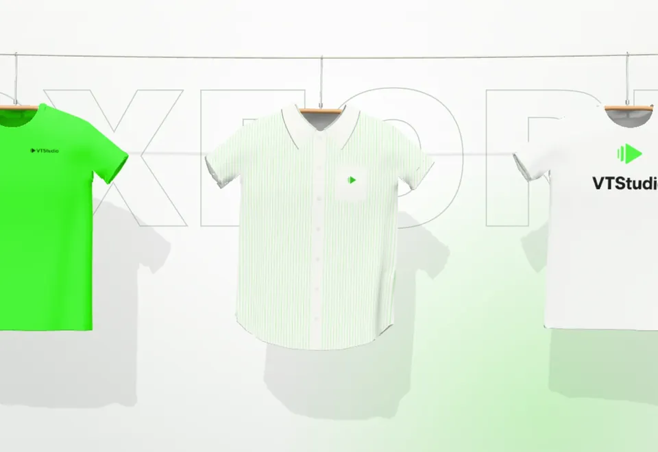 VTStudio-shirts en een overhemd aan houten hangertjes aan een waslijn